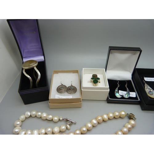 927 - A collection of silver and silver mounted jewellery including some set with abalone and mother of pe... 