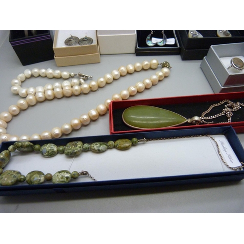 927 - A collection of silver and silver mounted jewellery including some set with abalone and mother of pe... 