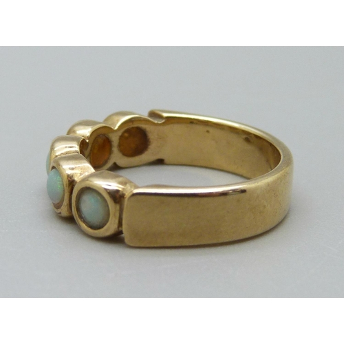 930 - A 9ct gold, five stone opal ring, 4.3g, K