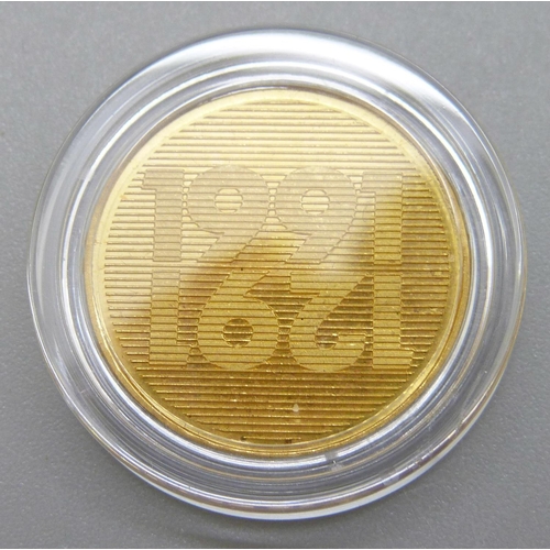 948 - A Swiss 1991 250 Francs gold proof coin, 0.900 fineness, 8g