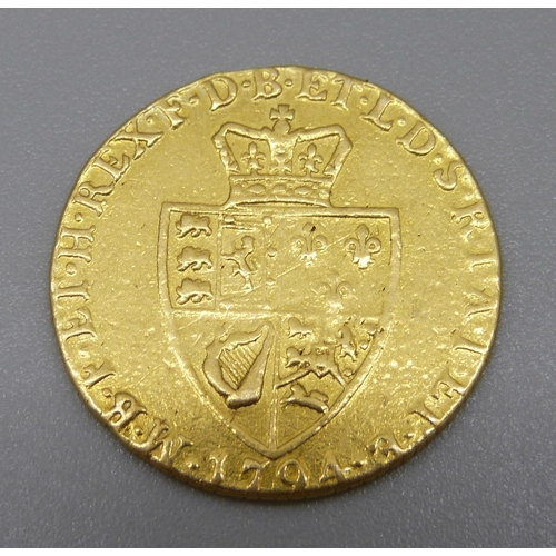 950 - A George III 1794 22ct gold guinea, 8.3g