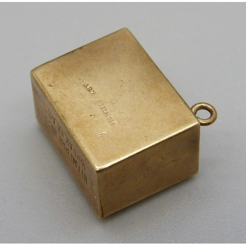 956 - A hallmarked 9ct gold £1 note charm, 2.7g