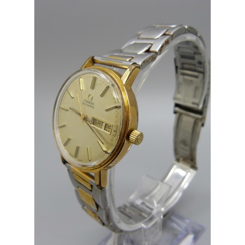 968 - An Omega automatic day-date wristwatch, the case back bears inscription dated 2002