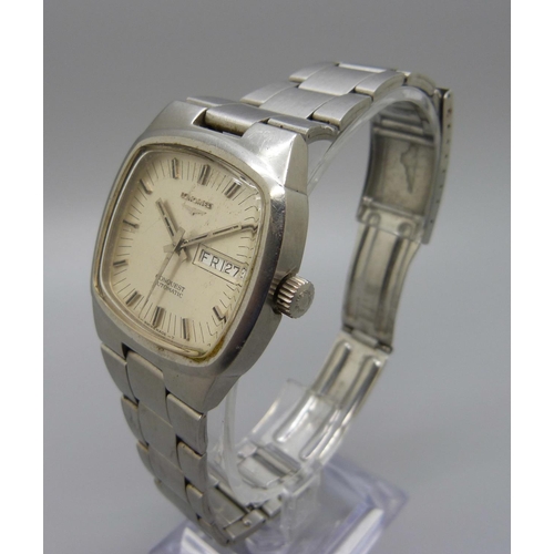 976 - A Longines Conquest automatic day-date wristwatch on a Longines bracelet strap