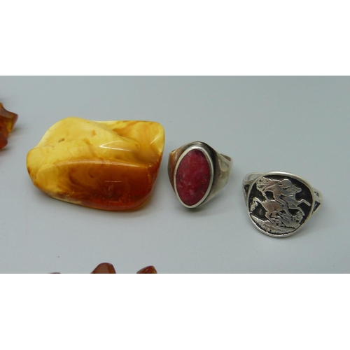 982 - Two amber necklaces, a brooch and two silver rings