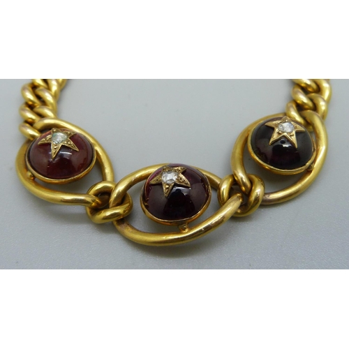 986 - A 15ct gold bracelet, with three cabochon garnets inset with diamonds in gold starburst, 20g