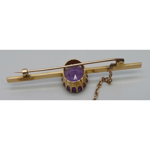 991 - A vintage 15ct gold and amethyst brooch, 7.7g