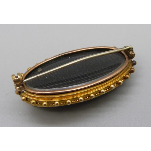 996 - A late Victorian yellow metal, pearl and onyx memorial brooch, total weight 14.8g, 42mm