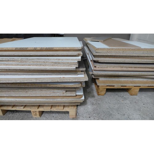 3195 - 2 Pallets of off-cuts chip board * This lot is subject to VAT