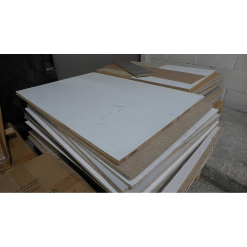 3195 - 2 Pallets of off-cuts chip board * This lot is subject to VAT