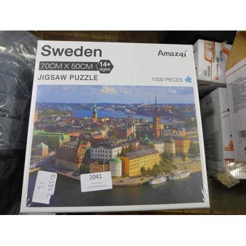 2041 - Three 1000 piece jigsaws, Art Nouveau French lady, Stockholm coastal scene and Dream house, (sealed)