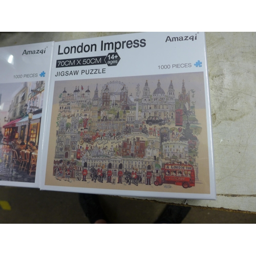 2042 - Three 1000 piece jigsaws, German stone castle,  Paris street scene and London impressionist sealed