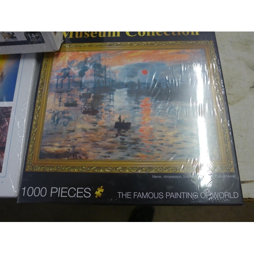 2043 - Three 1000 piece jigsaws, Hot Air Balloons, Positano-Itlay and Monet's 