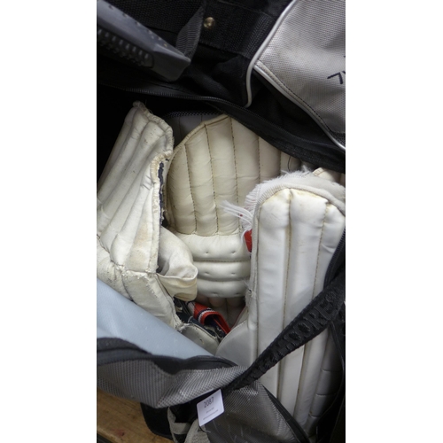 2087 - A Gunn & Moore cricket bag with cricket gear