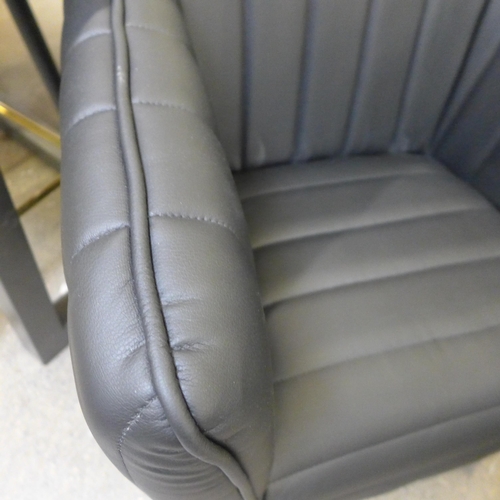 1476 - A Delph black leather effect tub chair