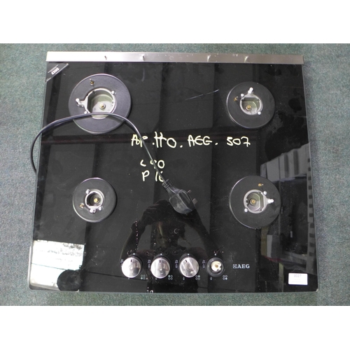 3027 - AEG Gas on Glass 4 Burner Hob - Black (H30xW590xD520) - model no.:- HG694340NB, original RRP £395 in... 