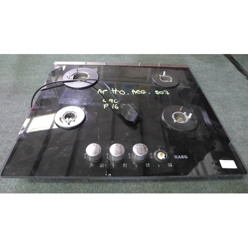 3027 - AEG Gas on Glass 4 Burner Hob - Black (H30xW590xD520) - model no.:- HG694340NB, original RRP £395 in... 