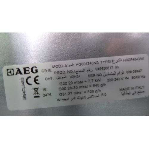 3027 - AEG Gas on Glass 4 Burner Hob - Black (H30xW590xD520) - model no.:- HG694340NB, original RRP £395 in... 