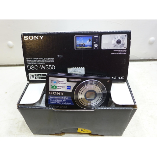 2222 - Two satnavs, Sony, boxed Cyber Shot digital camera and Sony Digital Handicam video camera