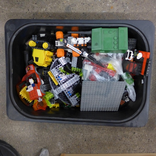 2245 - A four drawer unit with tubs of Lego and toy cars