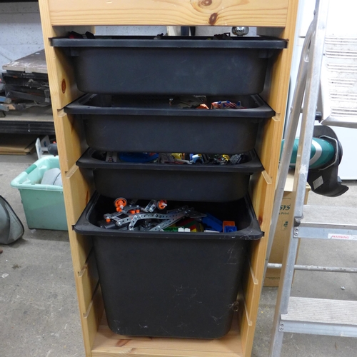 2245 - A four drawer unit with tubs of Lego and toy cars