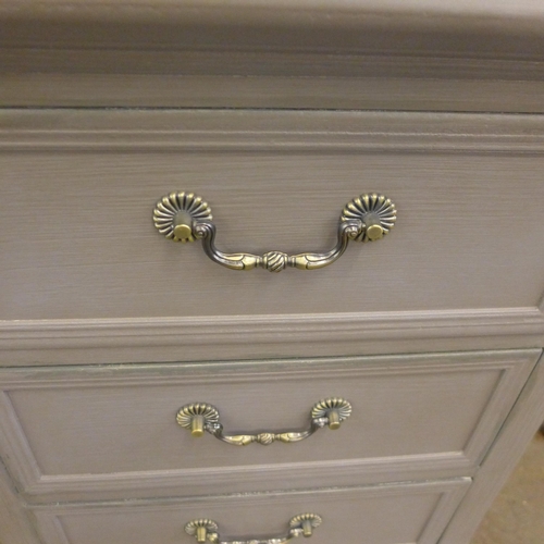 1523 - A grey three drawer bedside chest