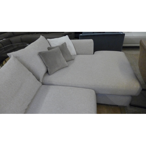 1545 - Large oatmeal upholstered L shaped sofa