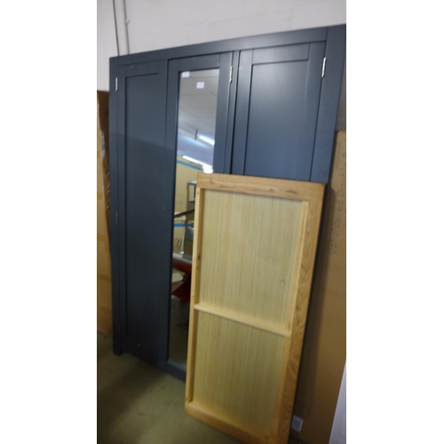 1631 - Oak and blue triple wardrobe - missing fixings  * This lot is subject to VAT