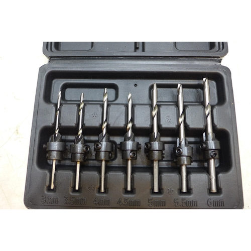 2221 - 500w drill, unused, drill bits, counter sinking drill bit set, 15 mtr tape measure and 1 spirit leve... 