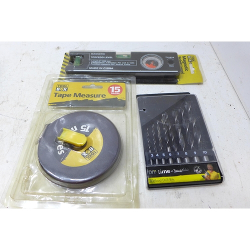 2221 - 500w drill, unused, drill bits, counter sinking drill bit set, 15 mtr tape measure and 1 spirit leve... 