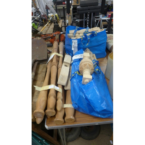 2274 - Two bags and a bundle of assorted solid timber spindles and carved wood legs