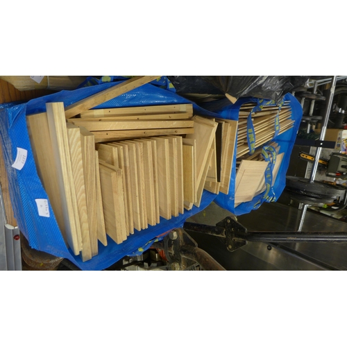 2277 - Three bags of assorted hard wood door panels and drawer runners