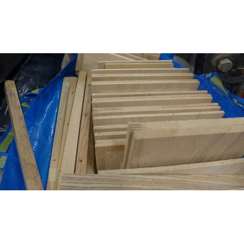 2277 - Three bags of assorted hard wood door panels and drawer runners