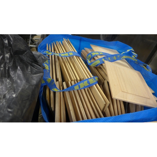 2277 - Three bags of assorted hard wood door panels and drawer runners