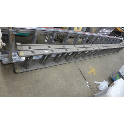 2278 - A double 16 rung aluminium ladder with stand off