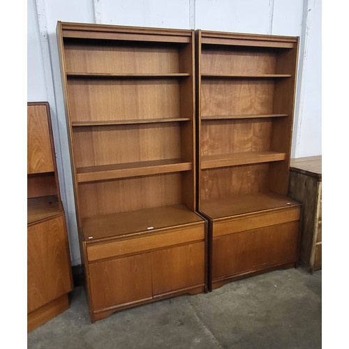 106 - A pair of teak bookcases