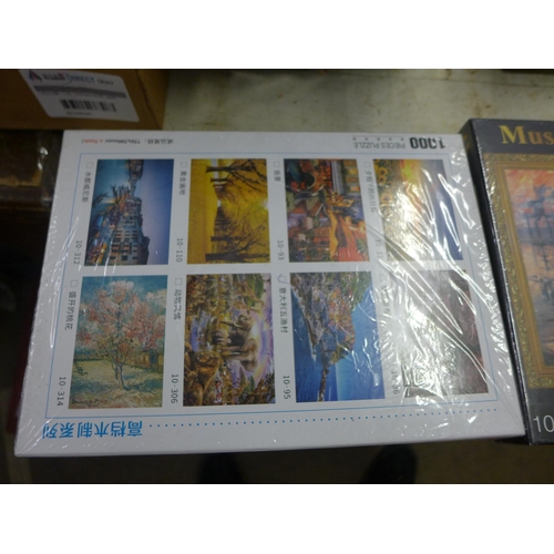 2141 - Three 1000 piece jigsaws, Hot Air Balloons, Positano-Itlay and Monet's 