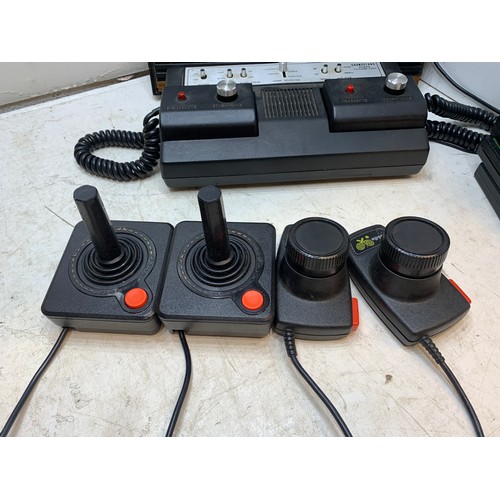 2226 - Atari 2600 Woody vintage gaming console with 7 games and vintage Grand Stand game - both W with joys... 