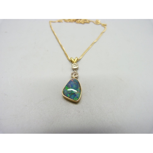 1014 - An opal and diamond set pendant on a 9ct gold chain, chain 3.6g