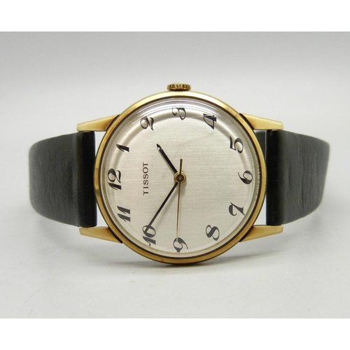 1016 - A 9ct gold Tissot wristwatch, the case back bears inscription dated 1980, 31mm case