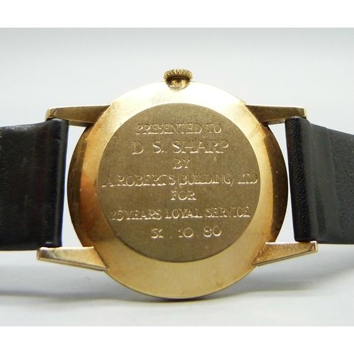 1016 - A 9ct gold Tissot wristwatch, the case back bears inscription dated 1980, 31mm case