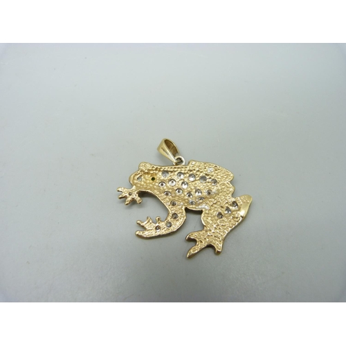 1028 - A large 9ct gold, stone set frog pendant, 12.4g