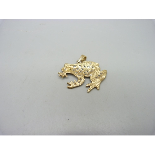 1028 - A large 9ct gold, stone set frog pendant, 12.4g