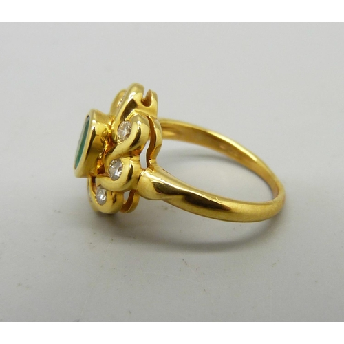 1031 - A 9ct gold, emerald and diamond ring, 3.8g, J