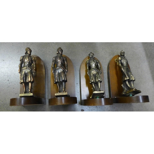 1037 - A pair of onyx bookends and two pairs of Spanish conquistador bookends