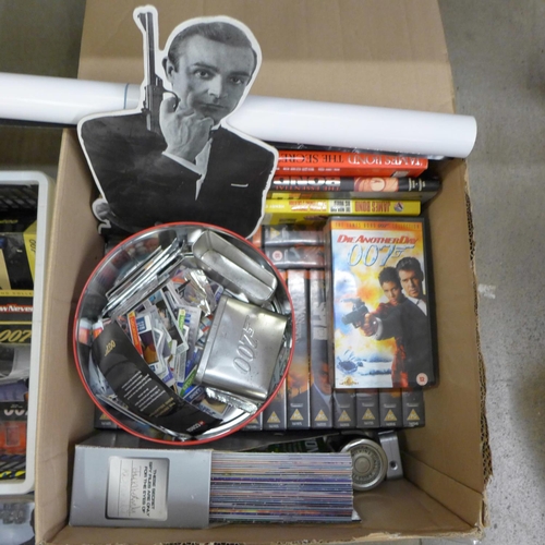 1054 - A large collection of James Bond related items including cars, videos and trading cards **PLEASE NOT... 