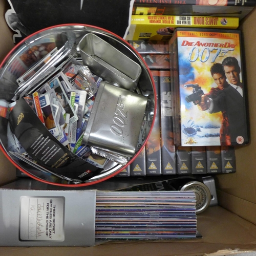 1054 - A large collection of James Bond related items including cars, videos and trading cards **PLEASE NOT... 