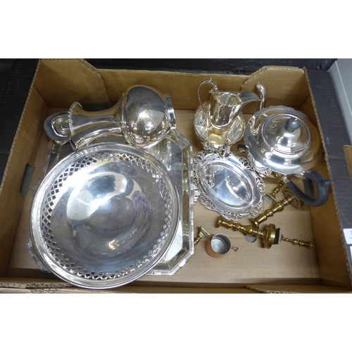 1098 - A four piece plated tea service, a plated tray, a plated bowl, a small tray, small candlesticks and ... 