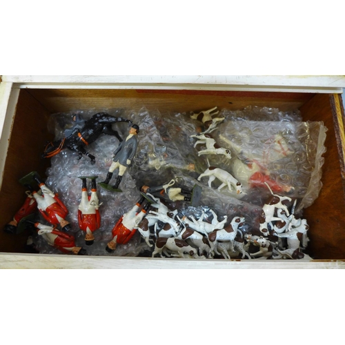 677 - A large collection of Britains lead hunting figures, some similar plastic and diorama accessories