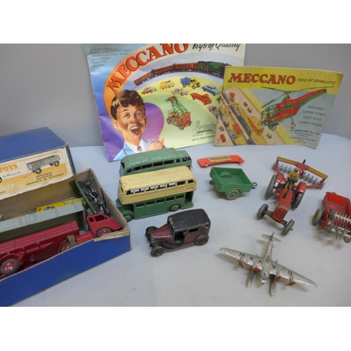 696 - A Dinky Toys 551 trailer, other Dinky Toys including two early buses and two Meccano toy brochures